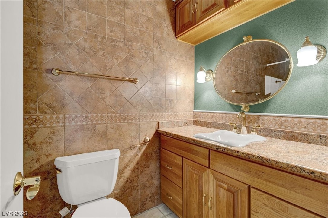 1407 Bronco Road Boulder City, NV 89005 - Photo 23 of 38 Second bathroom with custom tile and finishes