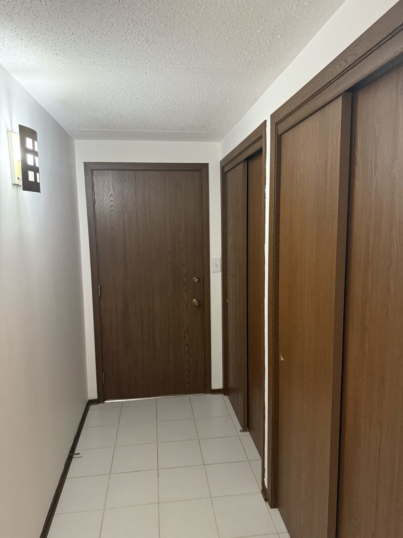 6950 West Forest Preserve Drive, Unit 202 Norridge, IL 60706 - Photo 14 of 15 wooden floor in an empty room
