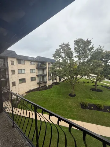 a view of a porch with a yard