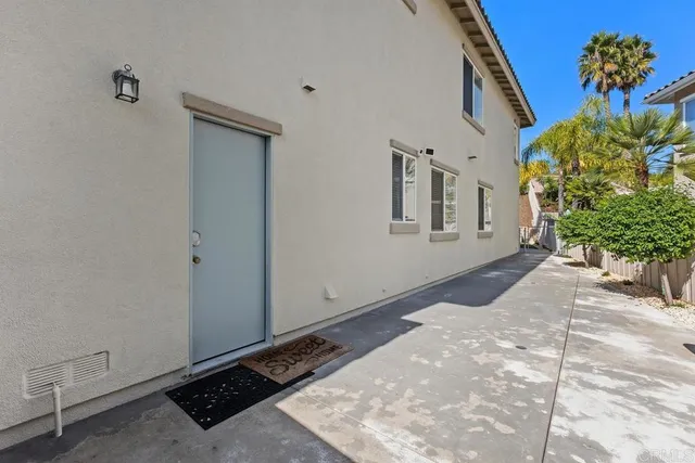 a house view with a outdoor space