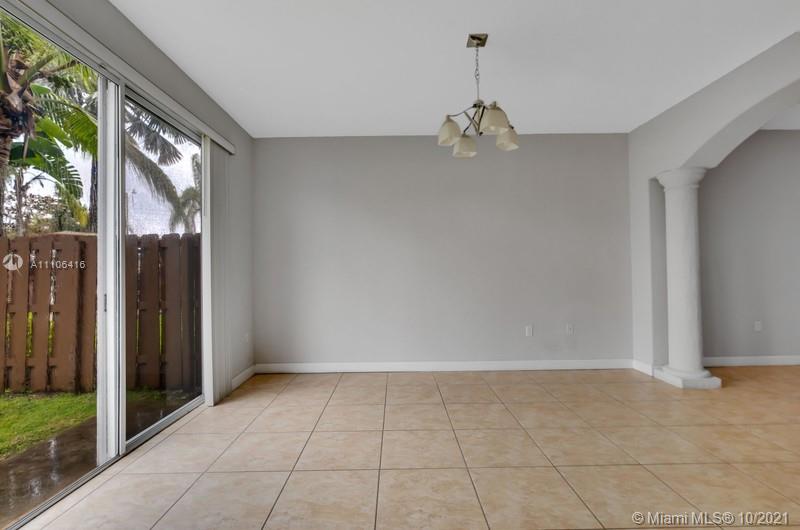 4131 Southwest 154th Court Miami, FL 33185 - Photo 12 of 36 a view of an empty room with a window