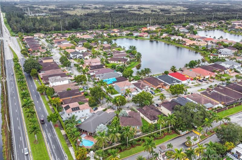 4131 Southwest 154th Court Miami, FL 33185 - Photo 34 of 36 an aerial view of residential houses with outdoor space and lake view