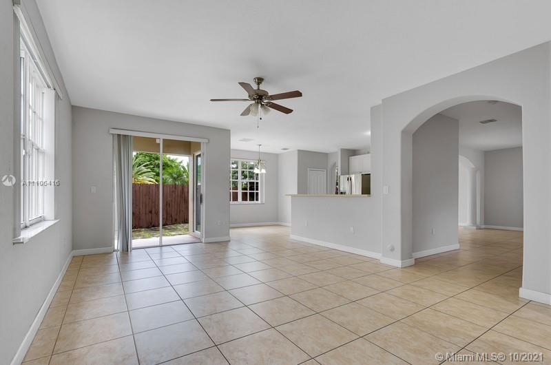 4131 Southwest 154th Court Miami, FL 33185 - Photo 10 of 36 a view of an empty room with a window