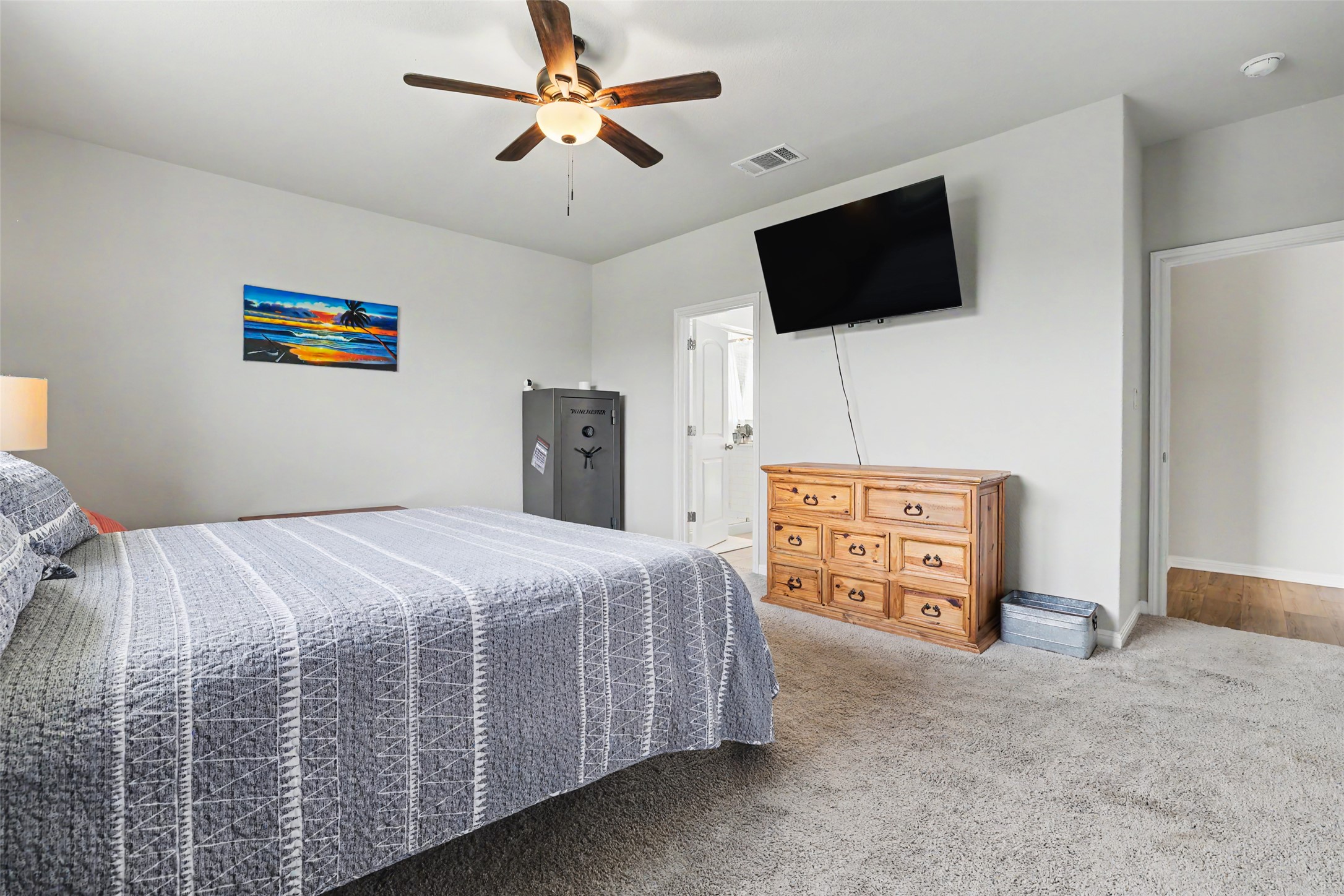 112 Rocking R Court Georgetown, TX 78633 - Photo 15 of 40 A comfortable bedroom featuring soft carpet and a convenient ceiling fan for ultimate relaxation.