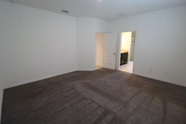 a bathroom with a sink double vanity and a mirror