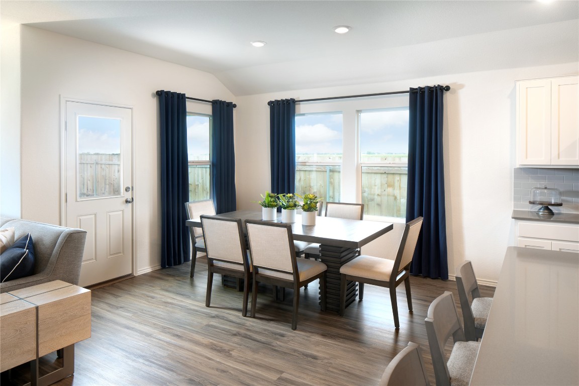 192 Reed Henry Drive Copperas Cove, TX 76522 - Photo 7 of 18 a view of a dining room with furniture and wooden floor