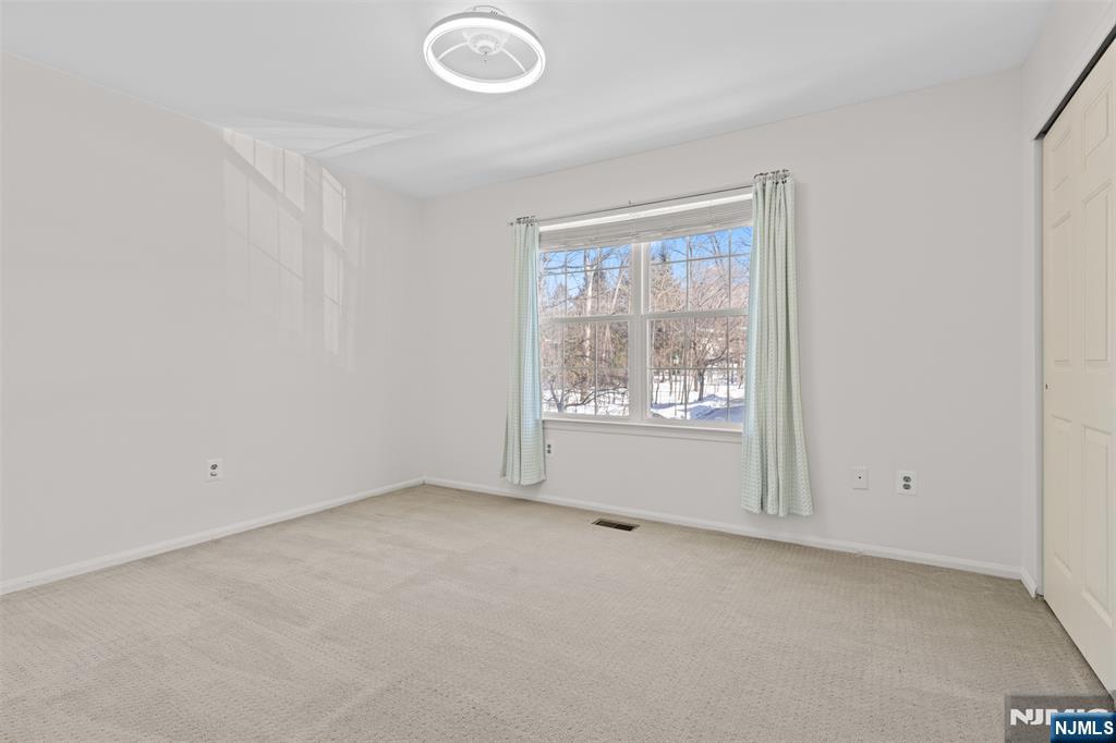 2384 Quill Court Mahwah, NJ 07430 - Photo 17 of 31 an empty room with a empty space and window