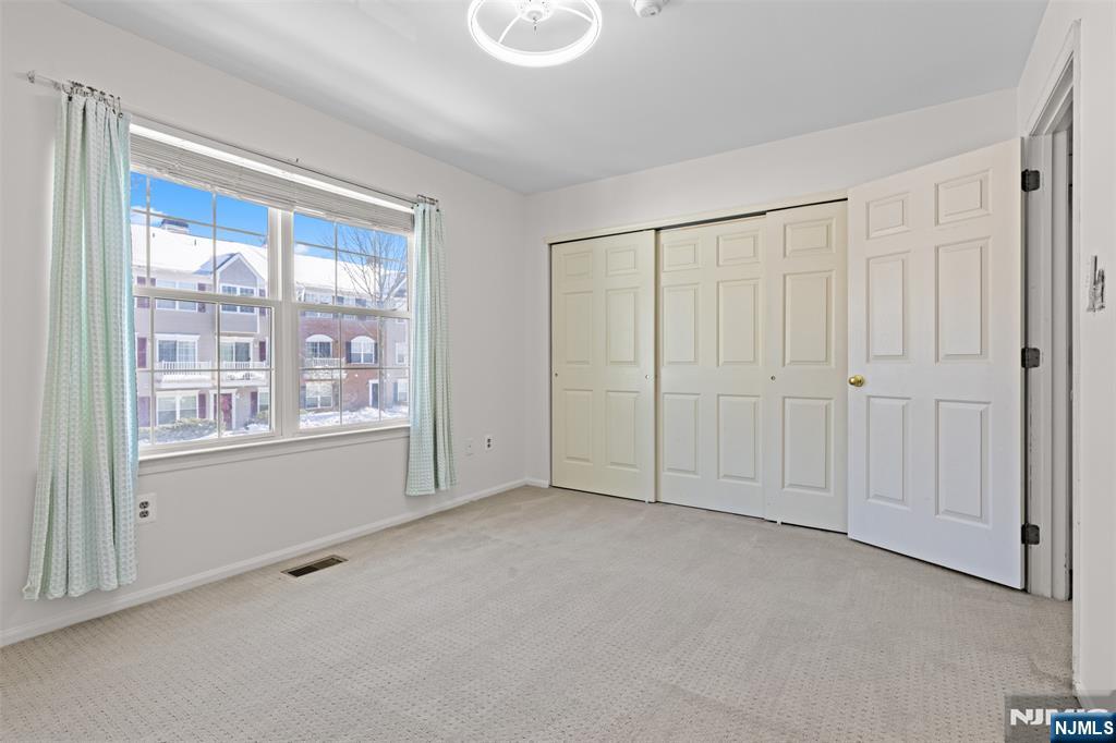 2384 Quill Court Mahwah, NJ 07430 - Photo 18 of 31 a view of an empty room with a window