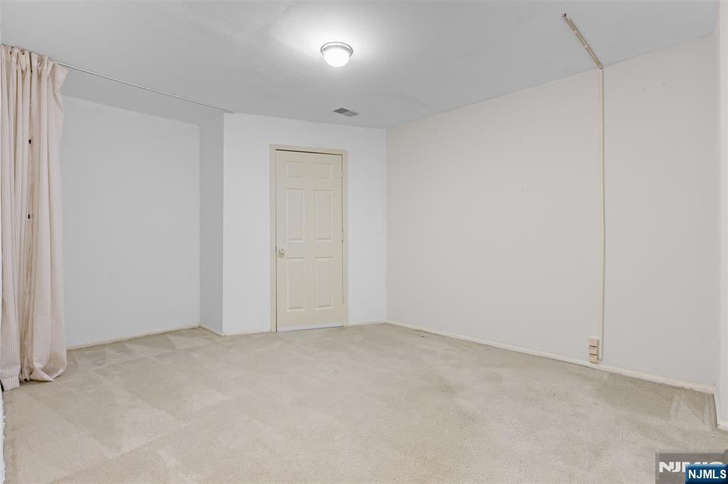 2384 Quill Court Mahwah, NJ 07430 - Photo 22 of 31 an empty room with an entryway
