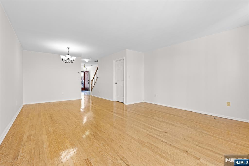 2384 Quill Court Mahwah, NJ 07430 - Photo 6 of 31 a view of empty room with wooden floor
