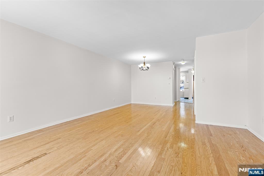 2384 Quill Court Mahwah, NJ 07430 - Photo 8 of 31 a view of empty room with wooden floor
