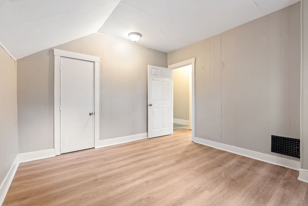 14-24 C Street, Unit 14 Northbridge, MA 01588 - Photo 19 of 25 a view of an empty room with wooden floor