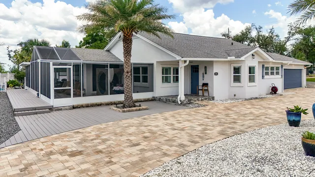 a front view of a house with a patio