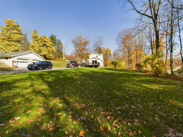 a view of house with outdoor space
