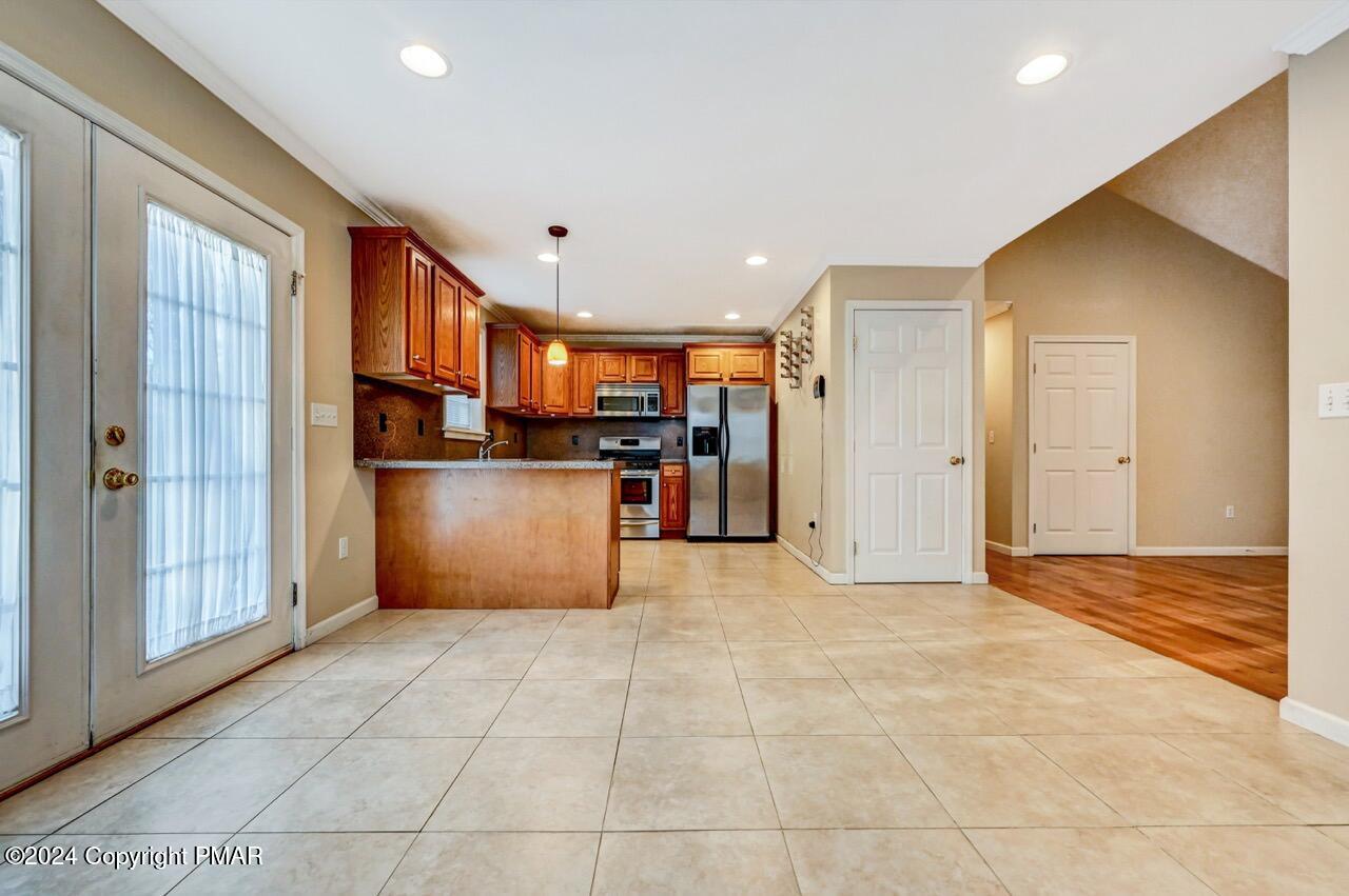 119 Woodland Road Albrightsville, PA 18210 - Photo 13 of 45 a view of kitchen appliances kitchen island granite countertop cabinets and a counter top space