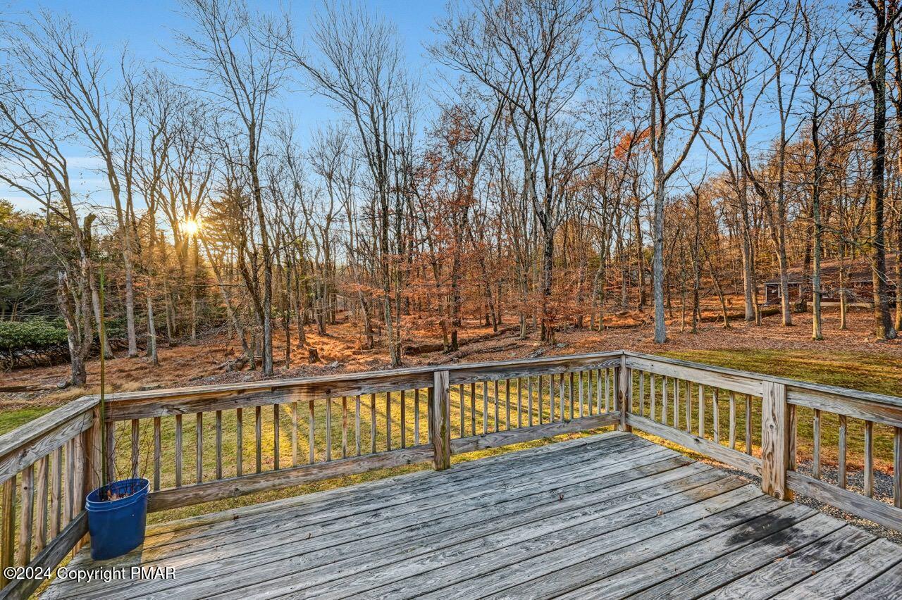 119 Woodland Road Albrightsville, PA 18210 - Photo 16 of 45 a view of a balcony with wooden floor and fence