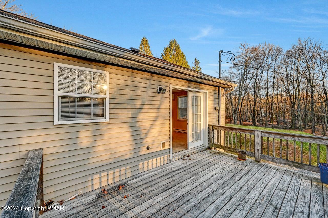 119 Woodland Road Albrightsville, PA 18210 - Photo 18 of 45 a view of a house with a deck