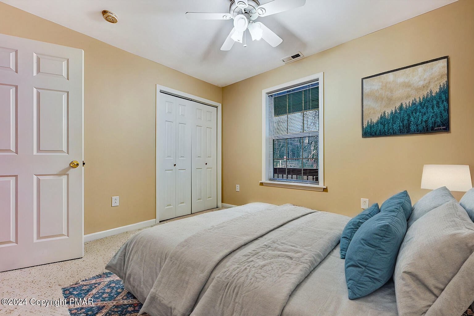 119 Woodland Road Albrightsville, PA 18210 - Photo 24 of 45 a bedroom with a large bed and a window