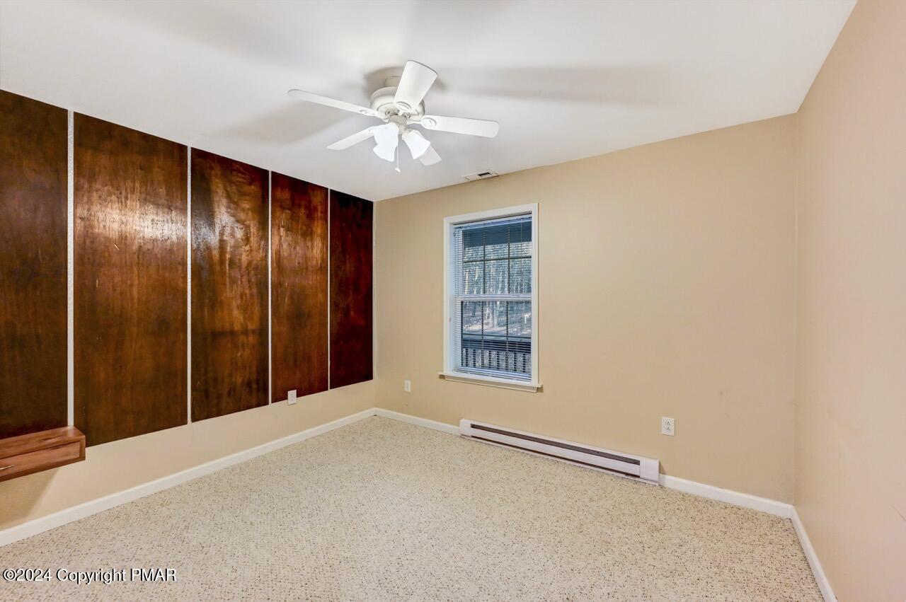 119 Woodland Road Albrightsville, PA 18210 - Photo 29 of 45 a view of an empty room with a window