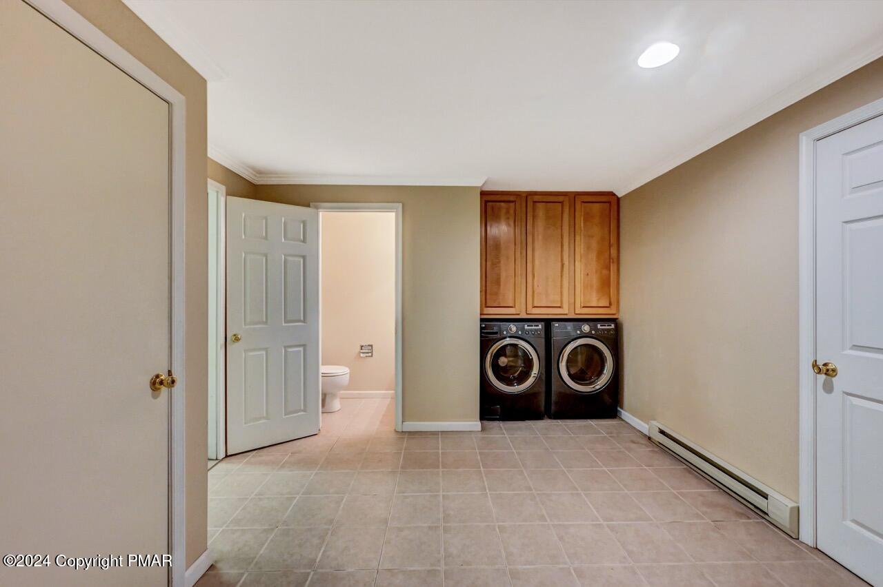 119 Woodland Road Albrightsville, PA 18210 - Photo 30 of 45 a view of a hallway with washer and dryer