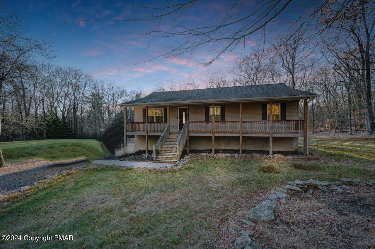 119 Woodland Road Albrightsville, PA 18210 - Photo 4 of 45 a view of house with backyard and trees