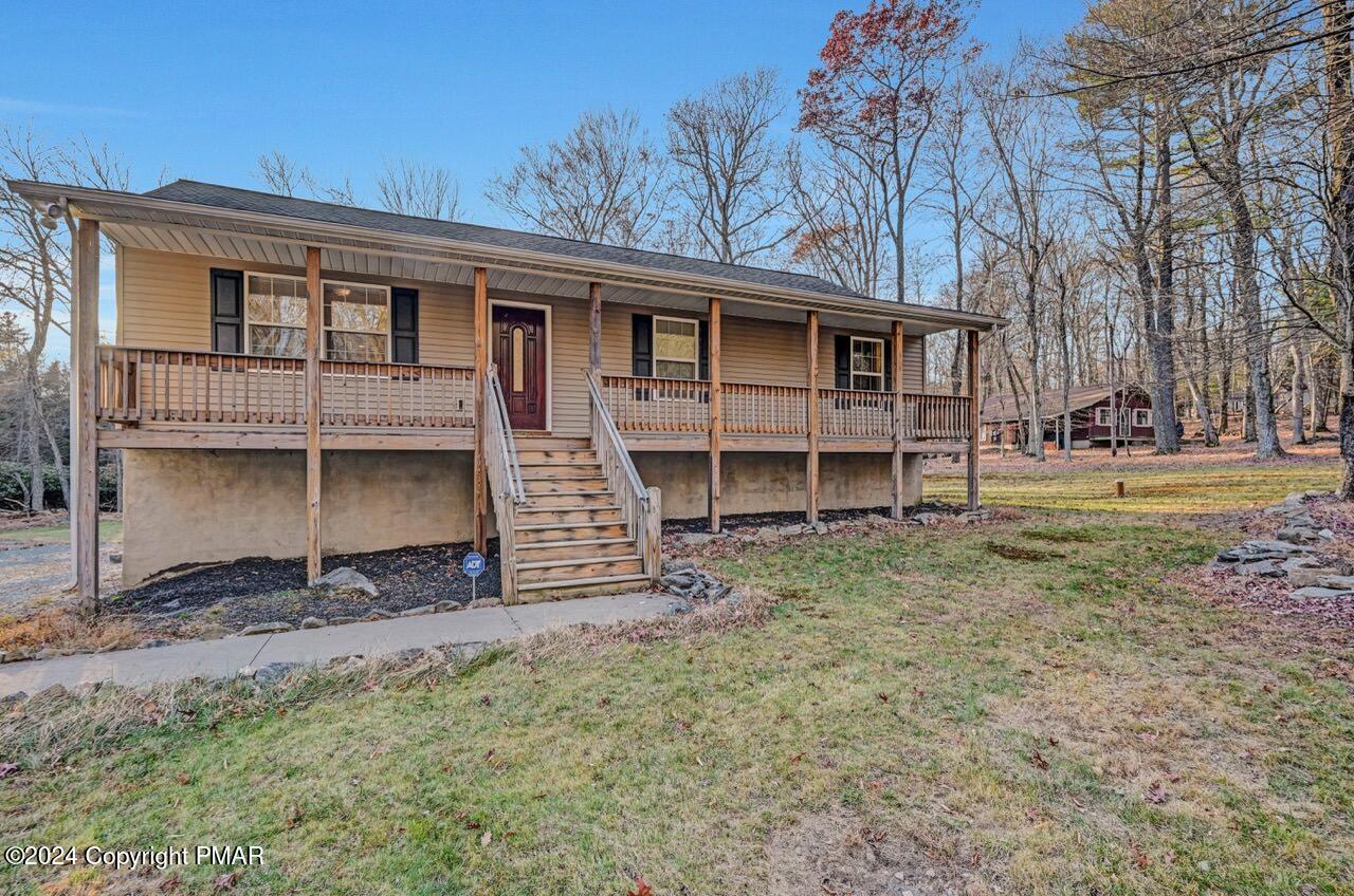 119 Woodland Road Albrightsville, PA 18210 - Photo 41 of 45 a front view of a house with a yard