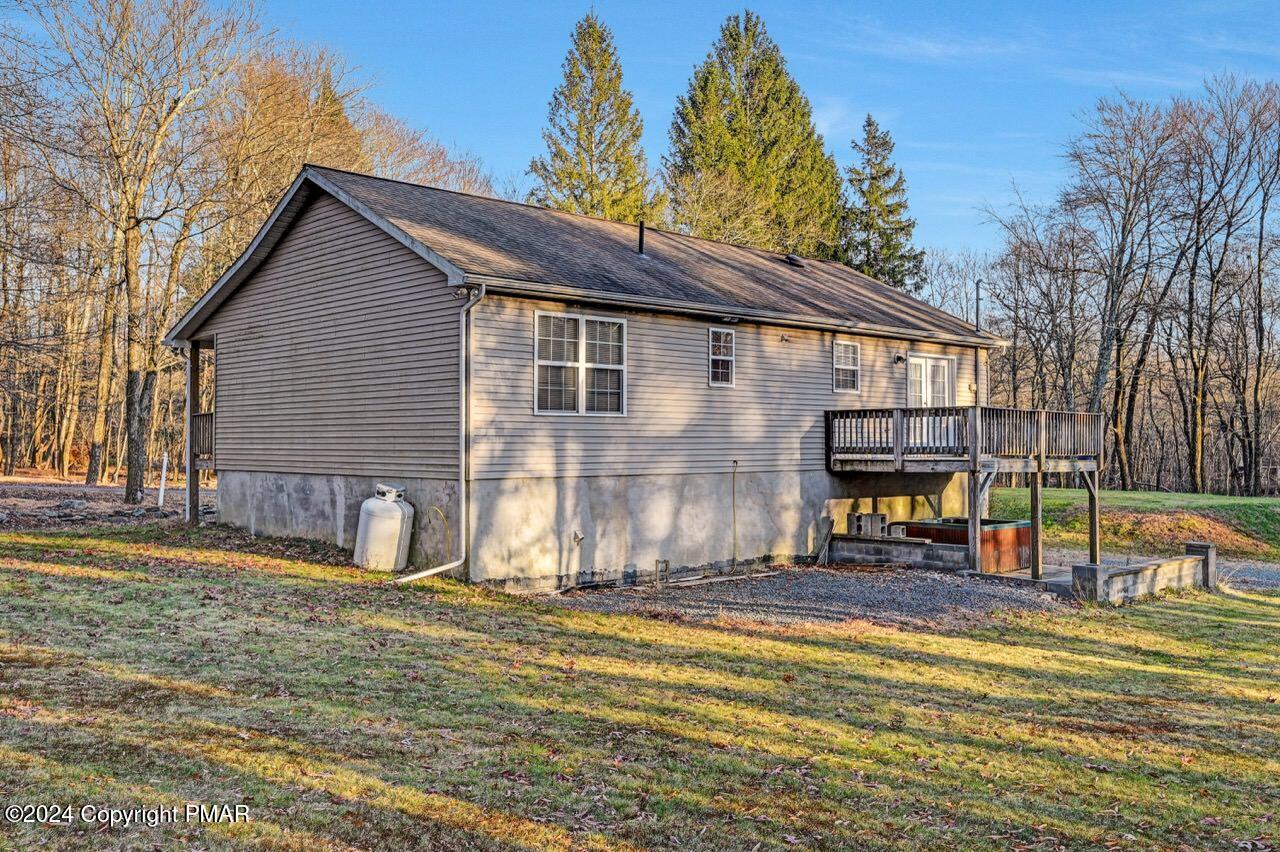 119 Woodland Road Albrightsville, PA 18210 - Photo 42 of 45 a view of a house with pool and chairs