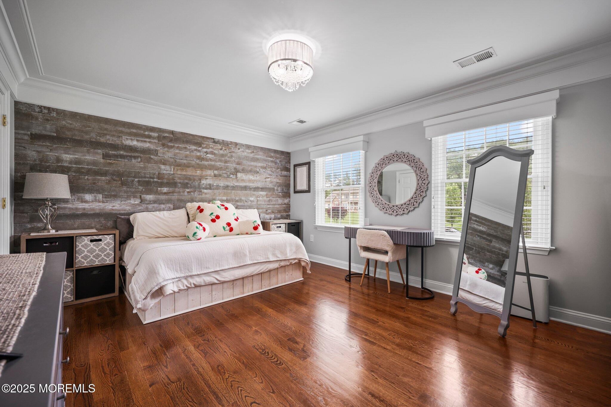4 White Pines Way Freehold, NJ 07728 - Photo 29 of 66 a bedroom with bed and a table