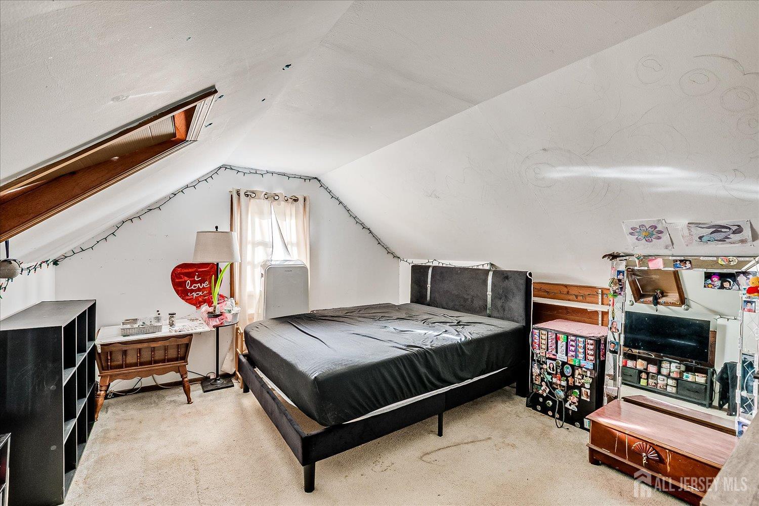 61 Stouts Lane Monmouth Junction, NJ 08852 - Photo 27 of 42 a bedroom with a bed and a window
