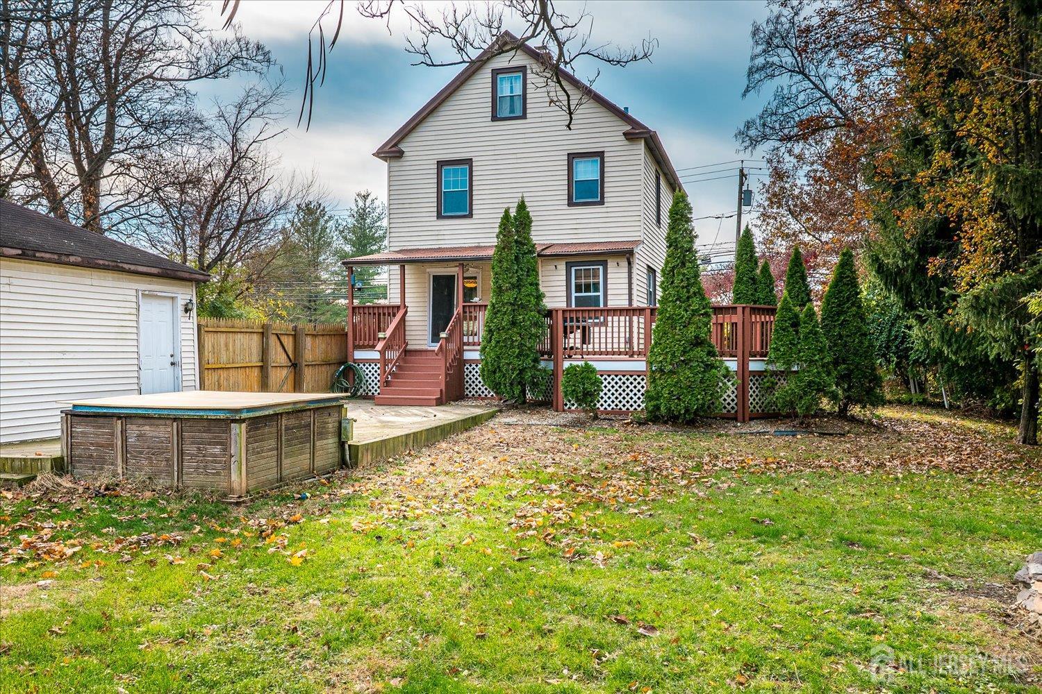61 Stouts Lane Monmouth Junction, NJ 08852 - Photo 34 of 42 a view of a house with a yard and sitting area