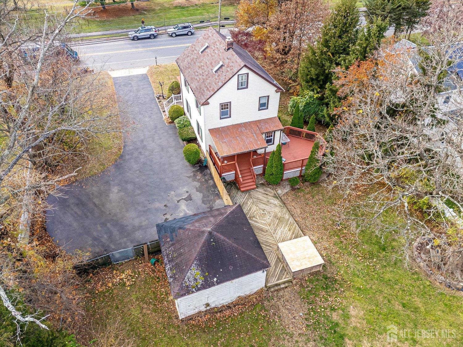 61 Stouts Lane Monmouth Junction, NJ 08852 - Photo 37 of 42 a view of a house with a yard