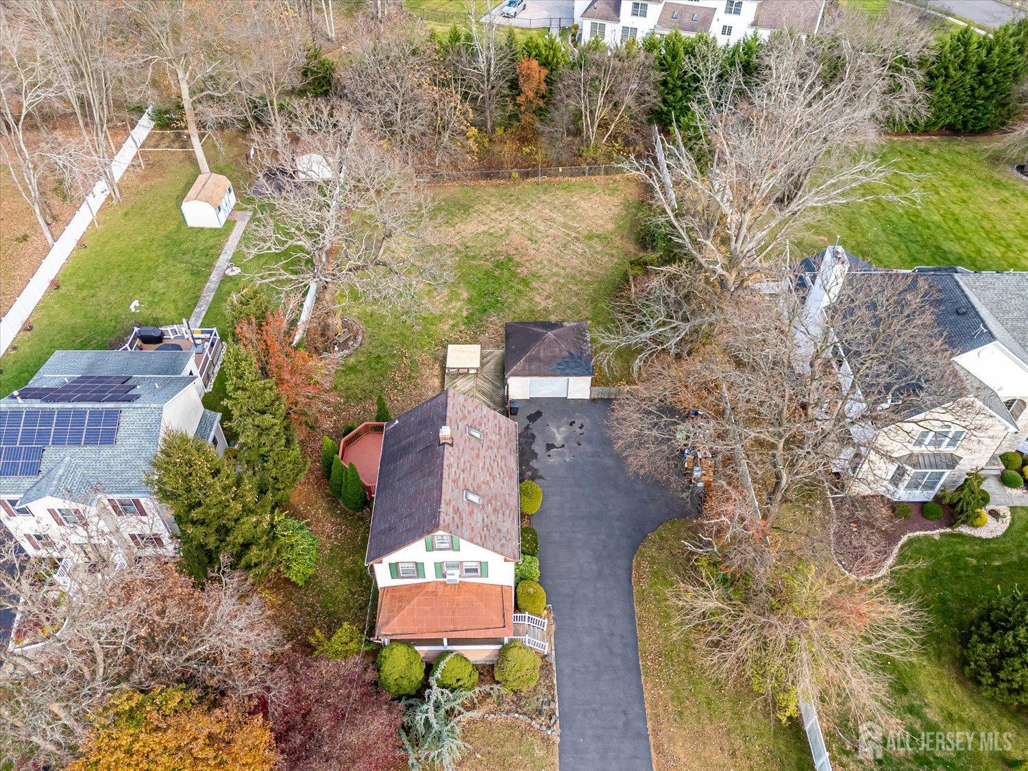 61 Stouts Lane Monmouth Junction, NJ 08852 - Photo 5 of 42 an aerial view of residential house with outdoor space