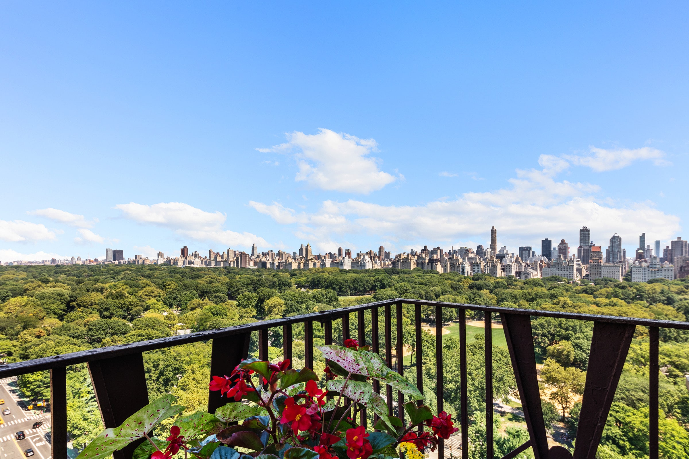 25 Central Park West, Unit 21Q Manhattan, NY 10023 - Photo 12 of 18 a view of a city and a lake
