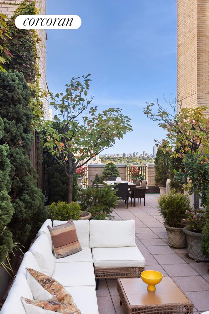 25 Central Park West, Unit 21Q Manhattan, NY 10023 - Photo 13 of 18 a view of a tables and chairs in the patio