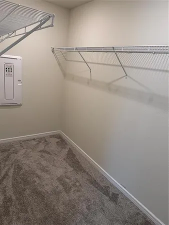 a view of a room with racks on the wall