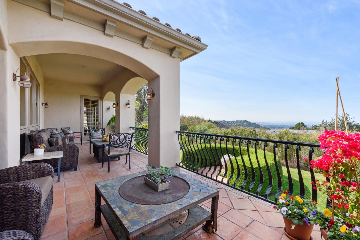 11550 Spur Road Monterey, CA 93940 - Photo 14 of 66 a view of a patio with couches table and chairs and potted plants