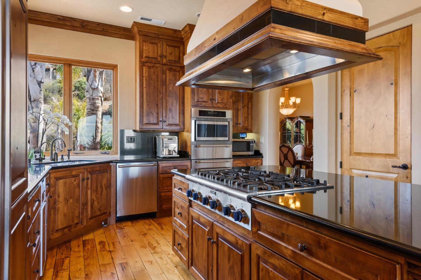 11550 Spur Road Monterey, CA 93940 - Photo 21 of 66 a kitchen with stainless steel appliances granite countertop a stove and a refrigerator
