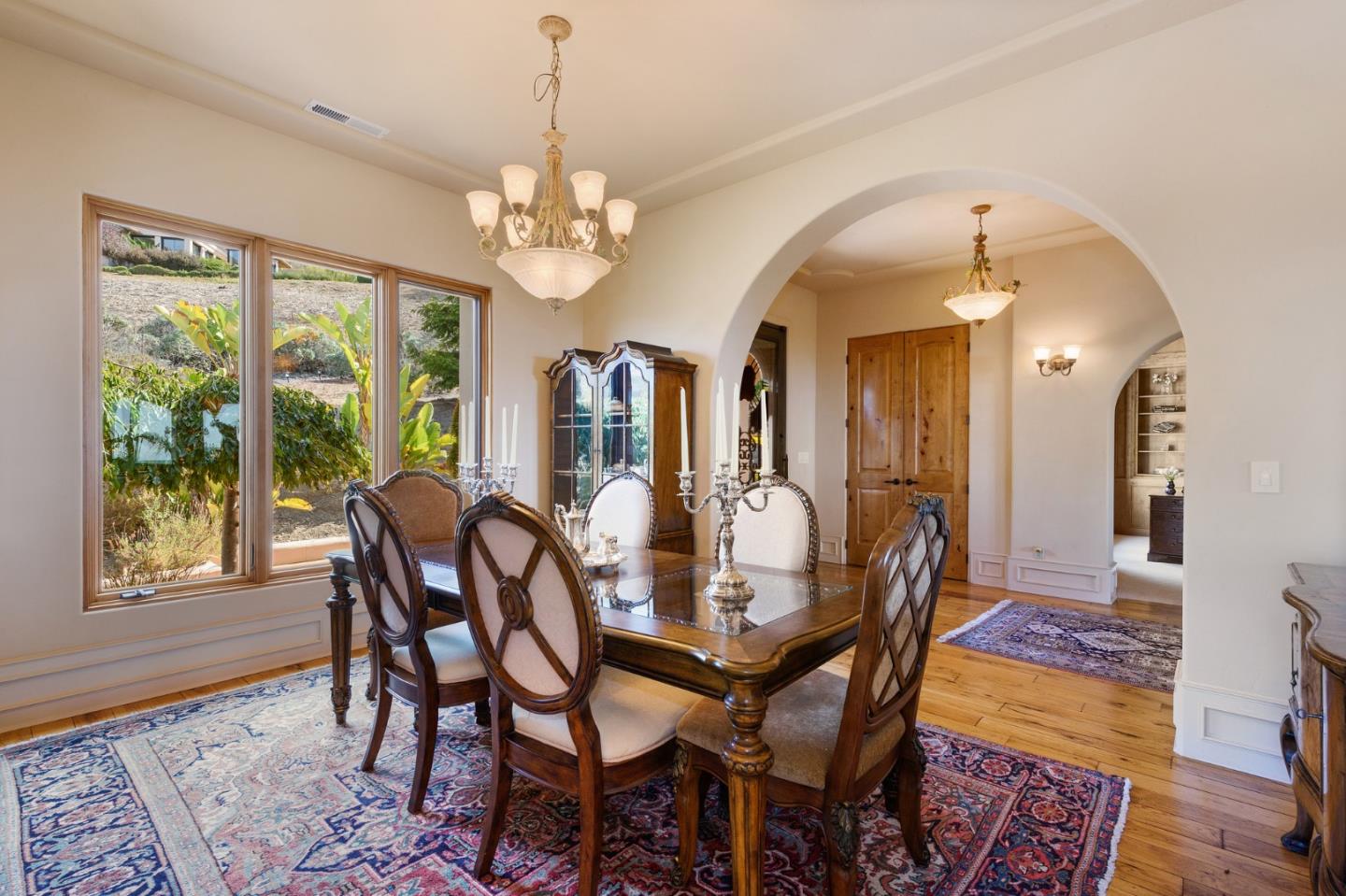 11550 Spur Road Monterey, CA 93940 - Photo 25 of 66 a view of a dining room with furniture window and wooden floor
