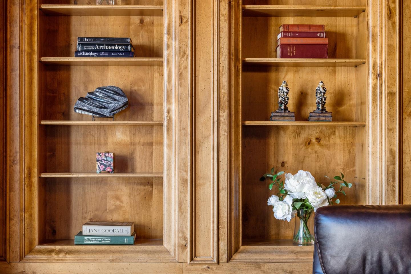 11550 Spur Road Monterey, CA 93940 - Photo 27 of 66 a vase of flowers sitting on a wooden floor