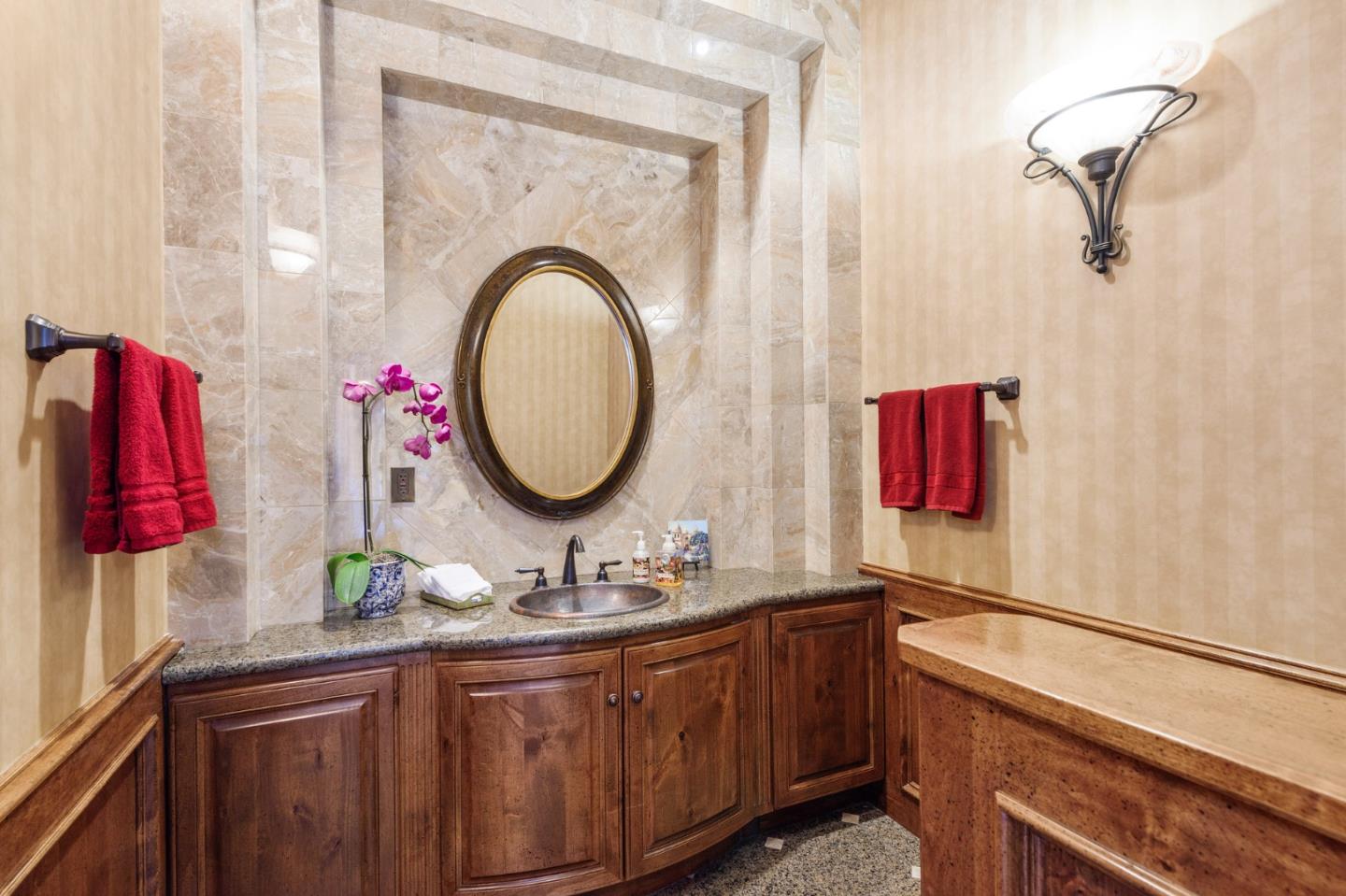 11550 Spur Road Monterey, CA 93940 - Photo 29 of 66 a bathroom with a sink and a mirror