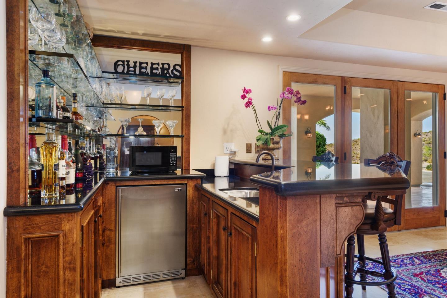 11550 Spur Road Monterey, CA 93940 - Photo 47 of 66 a kitchen with stainless steel appliances a sink and cabinets