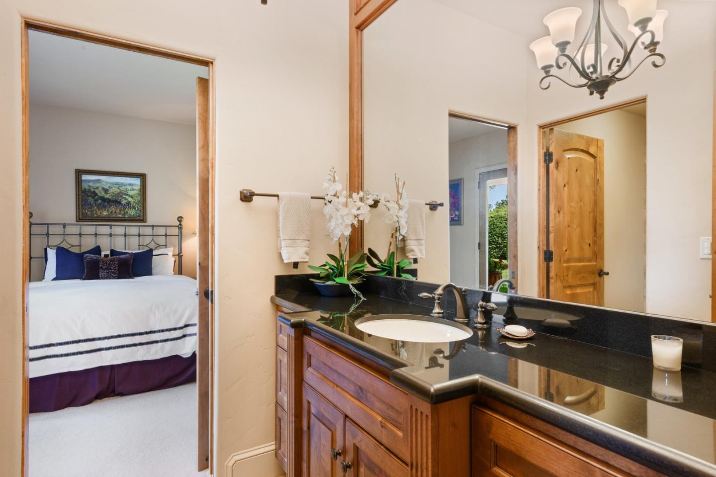 11550 Spur Road Monterey, CA 93940 - Photo 58 of 66 a bathroom with a sink and a mirror