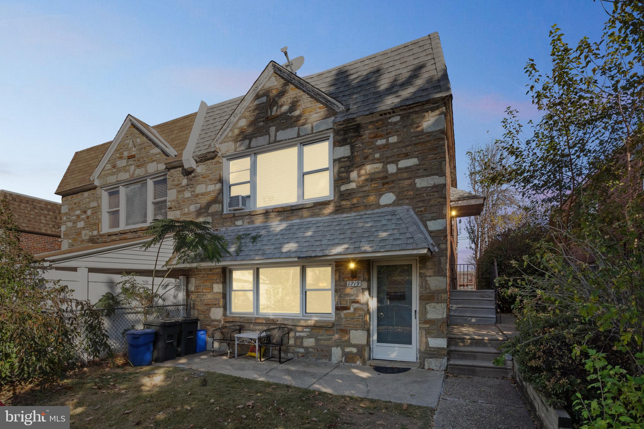 1719 Griffith Street Philadelphia, PA 19111 - Photo 1 of 31 a front view of a house with garden