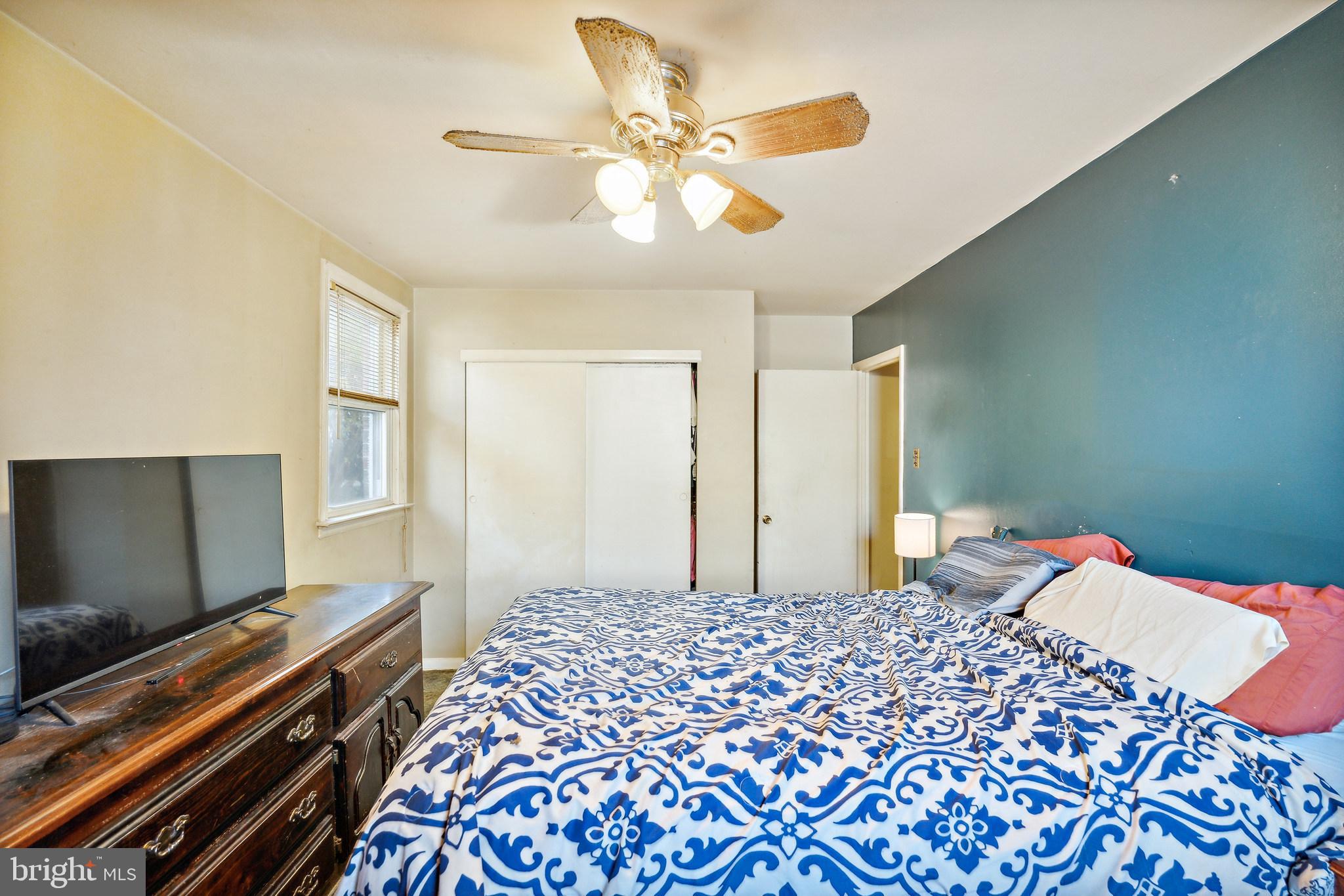 1719 Griffith Street Philadelphia, PA 19111 - Photo 11 of 31 a bedroom with bed and flat screen tv