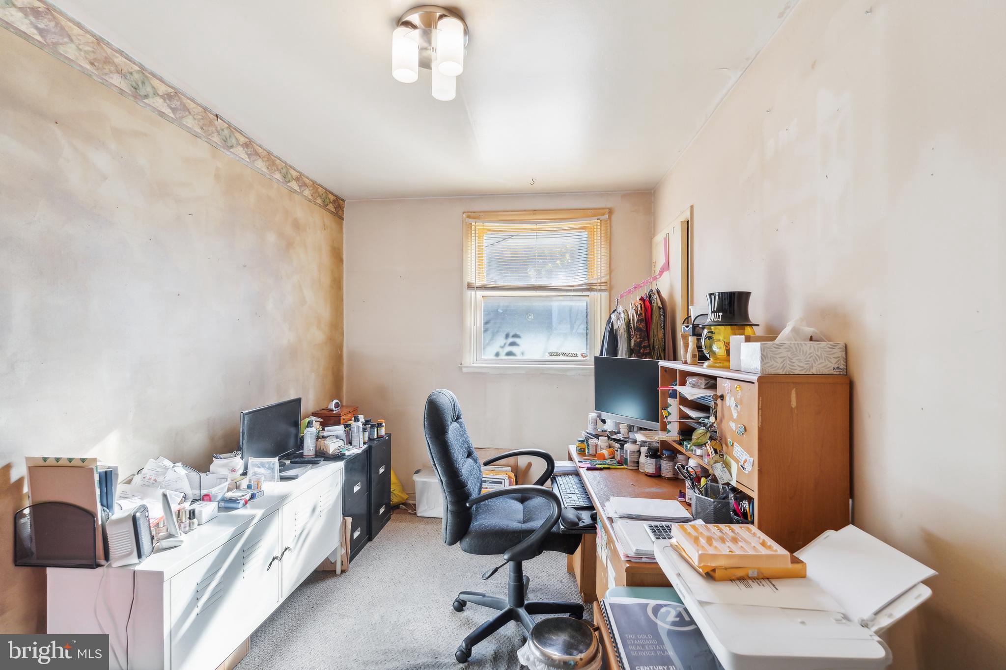 1719 Griffith Street Philadelphia, PA 19111 - Photo 27 of 31 a workspace with furniture and a window