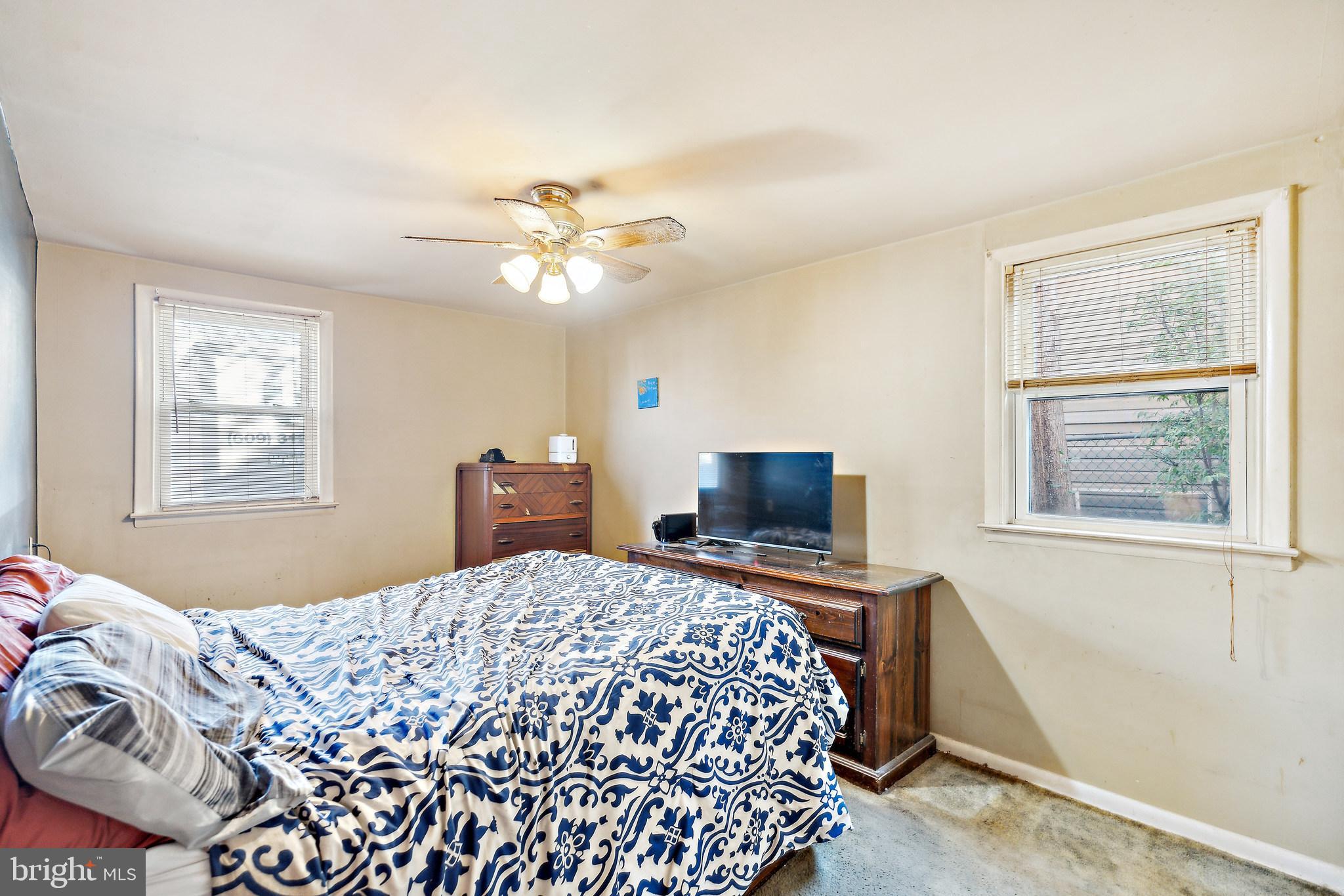 1719 Griffith Street Philadelphia, PA 19111 - Photo 10 of 31 a bedroom with a bed and a tv
