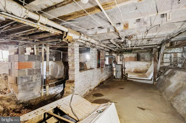a view of a house with a snow in a yard
