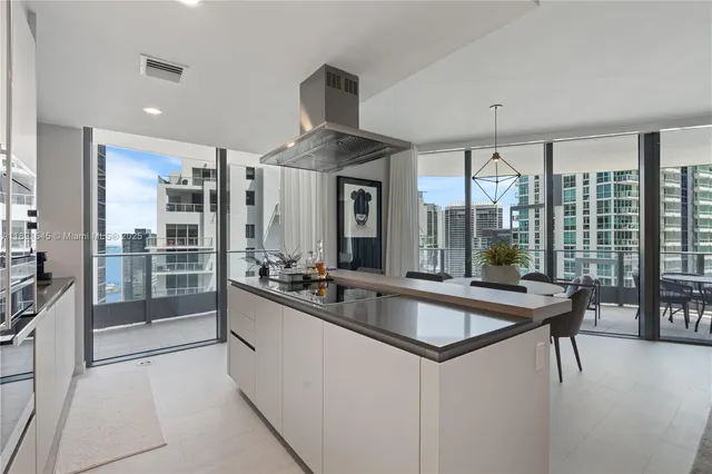 a kitchen with counter top space and stainless steel appliances