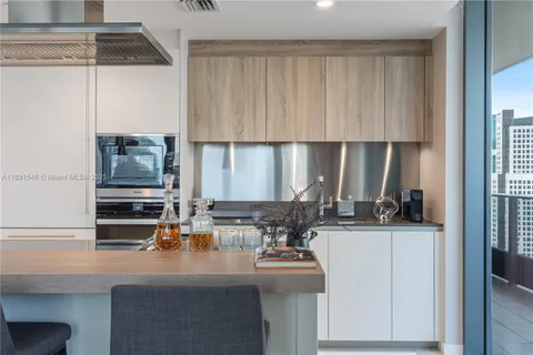 a kitchen with a sink and a cabinets