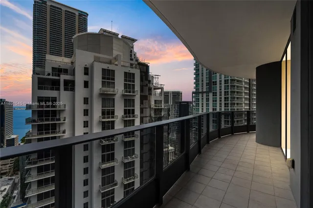a view of balcony with a potted plant